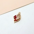 Macro detail of gold-plated dolphin pendant with red marquise stones and white zircons - Flame Style (01## Red)