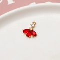 Detailed view of fan-shaped gold pendant with red pear-cut and white round zircons - Style 02 / 02#Red