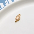 Macro detail of gold plated zircon pendant connector for DIY jewelry making - Style 13 Double Hole