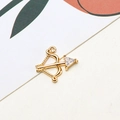 Macro detail of a gold-plated bow and arrow pendant with a sparkling zircon inlay - Bow and Arrow Design (02#)