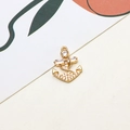 Detailed close-up of golden nautical anchor pendant with micro-pave cubic zirconia stones - Anchor Design (04#)