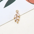 Macro detail of leaf-shaped gold plated pendant with five marquise-cut cubic zirconia - Leaf Style (07#)
