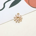 Macro shot of gold sunburst pendant with baguette-cut zircons for DIY jewelry making - Sunflower Style (09#)