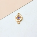 Detailed macro view of a gold plated clover pendant with a purple zircon and double loops - Type 01 Round Hollow Center (01#7*12mm) / 01#Light Purple