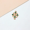Macro detail of gold-plated clover charm with green zircons and dual connecting loops - 03# Green