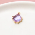 Macro detail of purple shield-cut gemstone pendant with gold six-prong setting for DIY jewelry - Light Purple