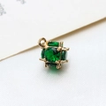 Macro shot of cubic pixel-style gold pendant with green faceted zircons for DIY jewelry - Large / Green