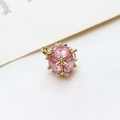 Macro shot of a hollow gold sphere pendant with pink zircons for jewelry making - Large / Pink