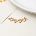 Détail de connecteurs en forme de cœurs entrelacés plaqués or et zircons pour bijoux DIY - 08#