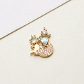 Detailed close-up of a gold-plated flower pendant with blue zircons and white crystals - Minimum 10 Pieces Price / Teardrop Blue Gem Shape (05#)