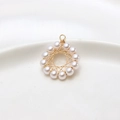 Macro shot of gold wire-wrapped pearl nest pendant with intricate star weaving detail - Starburst Circle Style (01#)