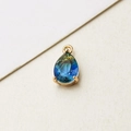 Detailed view of teardrop gradient glass pendant with gold-plated three-prong setting - 7*13mm / 02# Gradient