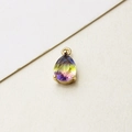 Macro detail of teardrop pear-cut glass pendant with gold-plated four-prong setting - 7*13mm / 11# Gradient
