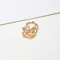 Close-up of gold-plated hollow geometric pendant with micro-set marquise zircon petals - Geometric Hollow Floral Style