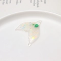 Detailed macro view of a resin butterfly wing charm with iridescent green sequins - Iridescent Transparent Wing Style with Green Hex Sequins (06#)