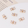 Bow-knot gold pendants with cubic zirconia for DIY jewelry making displayed on tray - Bowknot Style (04#)
