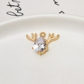 Close-up of golden reindeer pendant with cubic zirconia on white ceramic tray - Antler Teardrop (02#) / White (02#White)