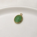 Oval faceted emerald green stone pendant with gold metal rim for DIY jewelry making - Jelly Light Green
