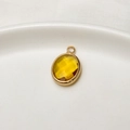 Oval yellow crystal birthstone pendant with gold plated trim for DIY jewelry making - Lemon Yellow