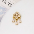 Macro detail of gold plated four-leaf flower charm with drop cubic zirconia tassels - 14*24mm / Gold