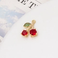 Macro detail of red cherry jewelry charm with gold plating and green zircon leaf - Red Round Green Leaf Style (Style-07)