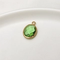 Green faceted oval birthstone pendant with gold plated copper frame for DIY jewelry - Pale Green