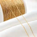 Bulk gold-plated flat O-chain jewelry accessory on a white spool for DIY designs - 1.2mm Flat O-link Chain (01#1.2mm Flat O-link Chain) / 1 Meter Length