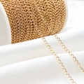 18K gold plated thin oval link chain accessory for DIY necklace jewelry making on a white spool - 1 Meter Length