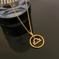 Gold plated Libra zodiac necklace featuring a sparkling cubic zirconia pendant charm - Libra / Gold