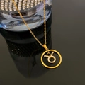 Golden Taurus zodiac necklace with sparkling zircon crystals on a fine link chain - Taurus / Gold