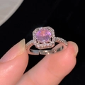 Macro detail of square halo pink zircon ring with shimmering pave stones on silver band - Square Halo Style (R332-60)