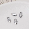 Macro shot of four polished silver lobster clasps for DIY jewelry making and necklaces - 12 Style / Silver