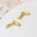 Macro detail of matte gold bamboo joint charms with hanging leaves for jewelry DIY - Bamboo Section with Leaf (04#5*12mm)