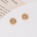 Close-up of gold-plated snowflake spacers with micro-paved zircon for jewelry DIY - Hollow Flower Style (02#8*7mm)