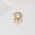 Detail of a gold ruyi lock pendant with micro-set zircons and tassel charm accents - Ruyi Lock Style (01#15*22mm)