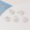 Detailed macro shot of five silver hollow carved bells for DIY jewelry accessories - 10mm / Silver