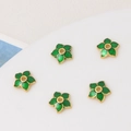 Macro detail of 5pcs 8mm green enamel flower spacer beads for DIY jewelry making - 8mm / Green Floral
