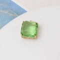 Detailed view of light green square gemstone pendant with gold-plated four-claw setting - Pale Green