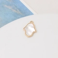 Macro detail of Hamsa pendant in gold plating with white mother of pearl inlay - 29# Small Hand (12*16mm)