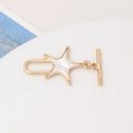 Detailed view of a gold star-shaped OT toggle clasp with white shell inlay for DIY jewelry - Star Style (03# 20x35mm)