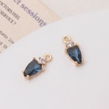 Macro view of blue teardrop pendant with zircon stone for DIY jewelry making - Ink Blue
