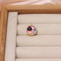 Macro detail of hand-painted floral pendant with freshwater pearls and pink enamel - Round Vintage Pink Enamel Style (01#)