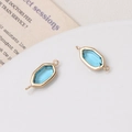 Lichtblauwe zeshoekige kristalverbinder met gouden frame en dubbele ogen voor DIY sieraden - Aqua