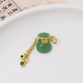 Detail of green jade-like fortune bag pendant with gold Fu character and tassels - 14x16mm / Green Fudai Style (04#)