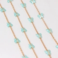 Detail of gold-plated O-chain featuring mint blue acrylic butterfly charms for DIY jewelry - Gold Plated Aqua Blue Butterfly
