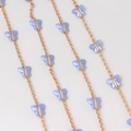 Detail of gold-plated O-link chains with pearlescent purple acrylic butterfly charms - Gold Plated Light Blue Butterfly