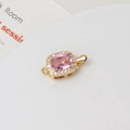 Detailed close-up of a gold-plated clasp with rectangular pink stone and zircon border - Pink Rectangle (9x16mm)