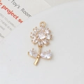 Macro shot of gold floral sunflower pendant with cubic zirconia for DIY jewelry - Daisy with Stem Style (05#14*28mm)
