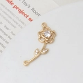 Detailed view of a gold-plated rose jewelry connector with micro-set cubic zirconia for DIY - Rose Connector Style (04#12*32mm)
