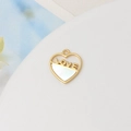 Macro shot of 18K gold plated heart pendant with white mother of pearl and LOVE engraving - LOVE Hollow Heart Style (02#)